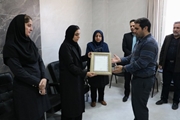 تجلیل رییس مرکز بهداشت شهدای والفجر از خانواده شهید حسن محمدی  مدافع سلامت